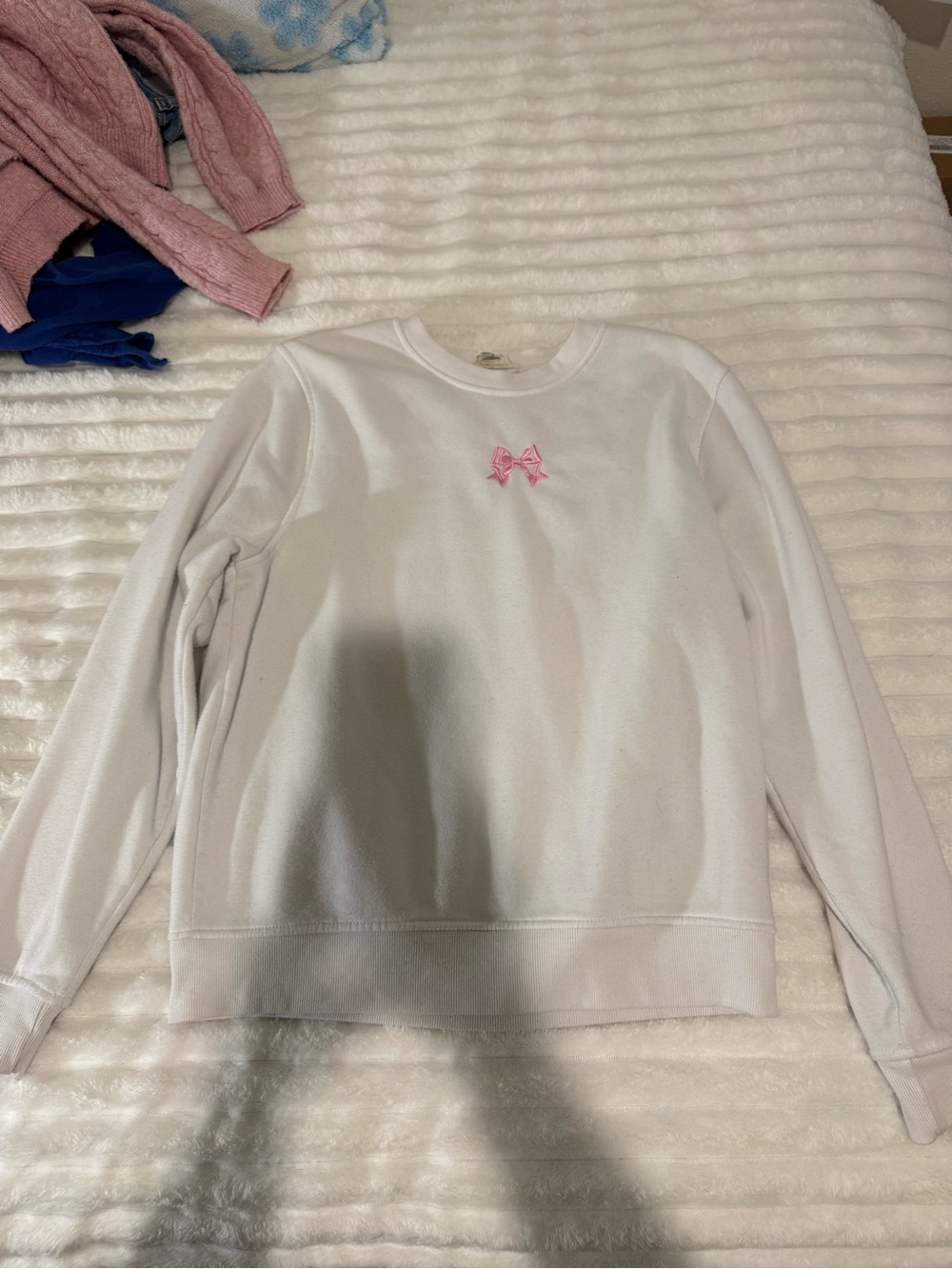 Women’s White Crewneck Sweater with Pink Bow Accent